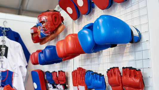 amas store with martial arts gloves, face shield, and other accessories